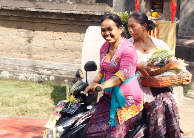 Balinese women dressed beautifully for temple